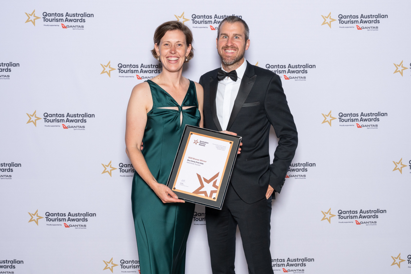 Tara and Steve Howell collecting National Tourism Award